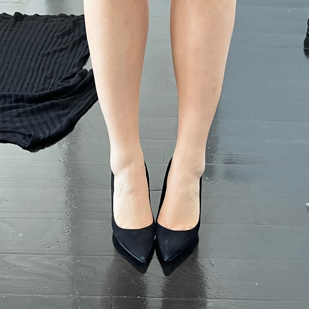 Black suede pumps